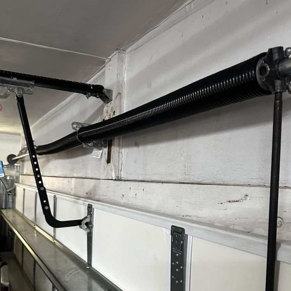 New torsion spring installed — garage door spring replacement Boston MA