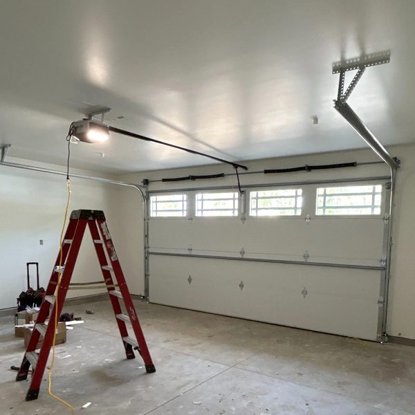 New garage door installation in progress — Boston MA