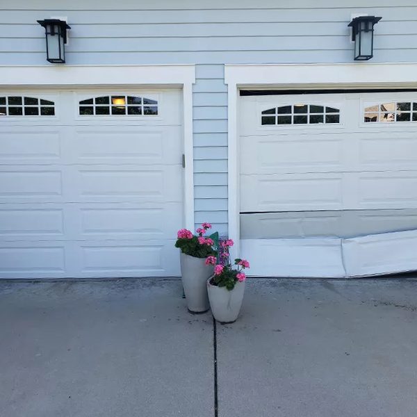 Emergency garage door repair — damaged door panel Sacramento TX